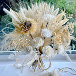 Load image into Gallery viewer, front view of preserved ivory bridal bouquet with neutral dried florals