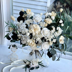 Load image into Gallery viewer, Side view of an ivory preserved bridal bouquet showing layered florals and airy texture