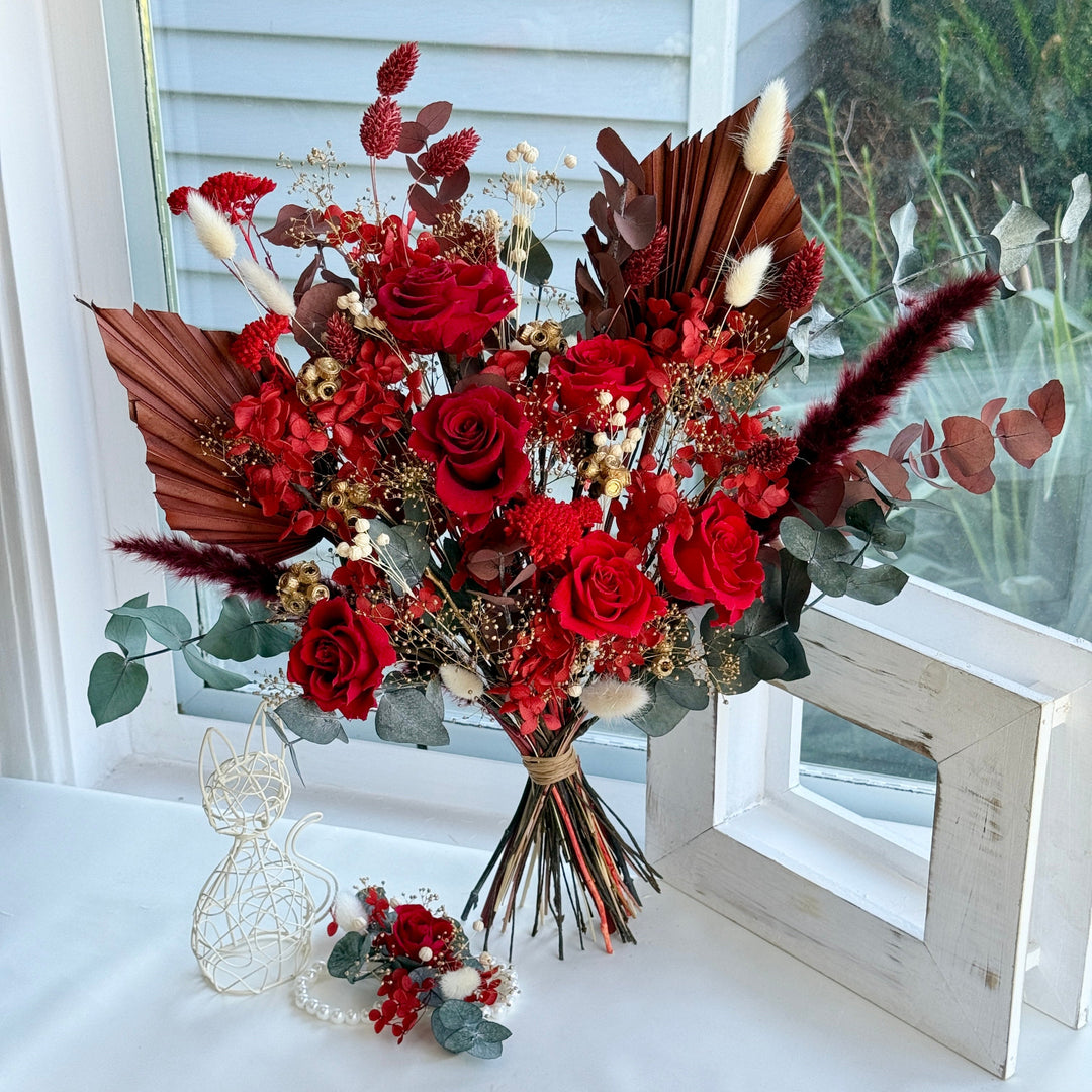 front view of luxury preserved red bridal bouquet