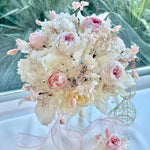 Load image into Gallery viewer, Close-up of blushing garden rose preserved bridal bouquet showing lush floral texture