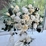 Load image into Gallery viewer, Front view of elegant ivory preserved bouquet with soft white blooms and natural green foliage