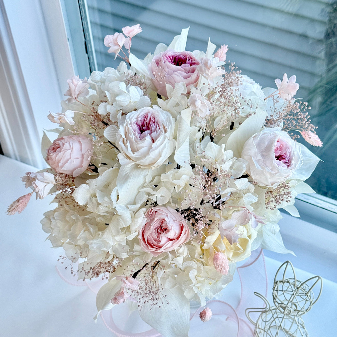 Blushing garden rose preserved bridal bouquet with blush pink roses and ivory florals, full rounded design