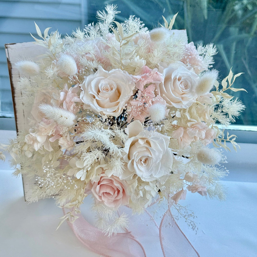 front view of preserved blush bridal bouquet with soft rounded shape.