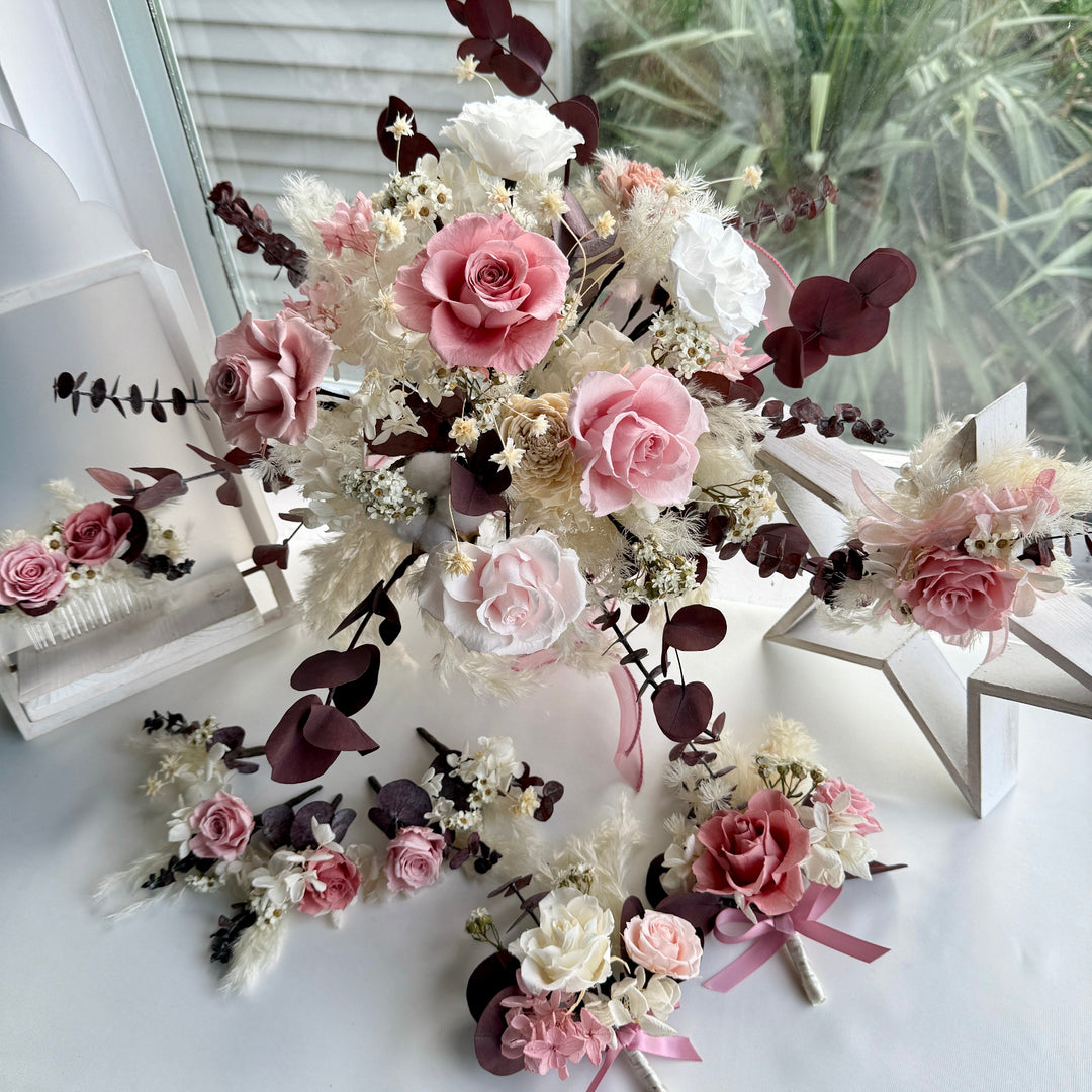 Full preserved bridal bouquet set including matching florals, styled together in blush and ivory tones